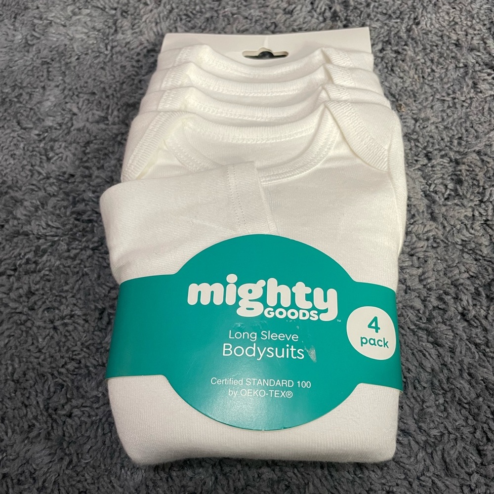 NWT newborn size long sleeve bodysuits